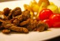 Biefstukreepjes met ui en champignons